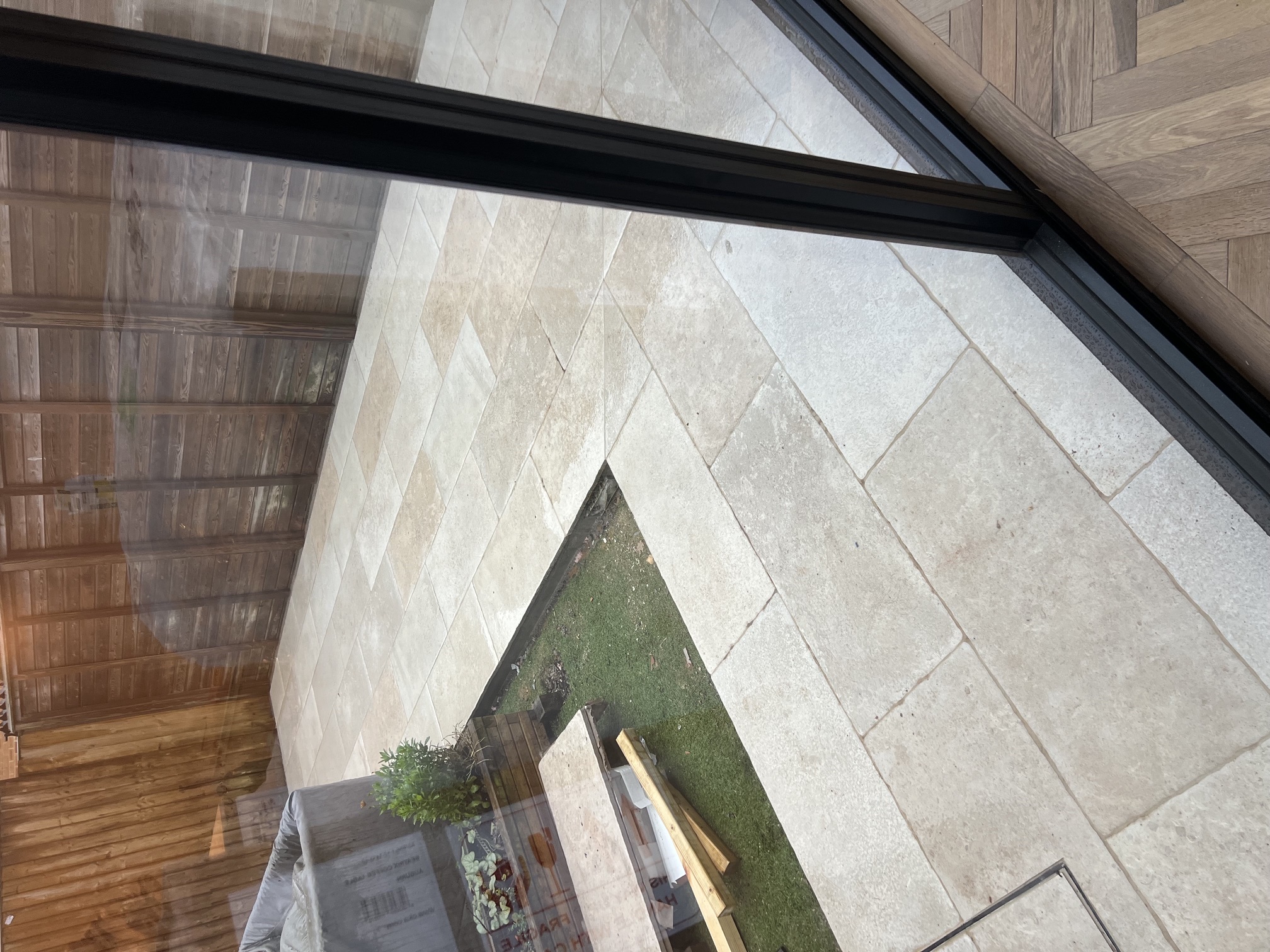 Travertine stone patio and terrace laid outside a rear extension